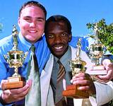 Andrew Smith (left) and Abel Phaswana were named top student and most improved student respectively at the 9th graduation ceremony of the African Academy for Computer Assisted Engineering. The students, who completed their studies at the end of 2001, received cash awards from Autodesk.